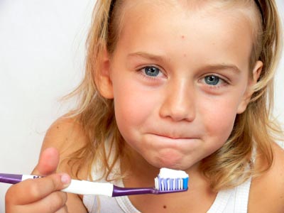 Cosmetic Dentistry Tips for Kids brush
