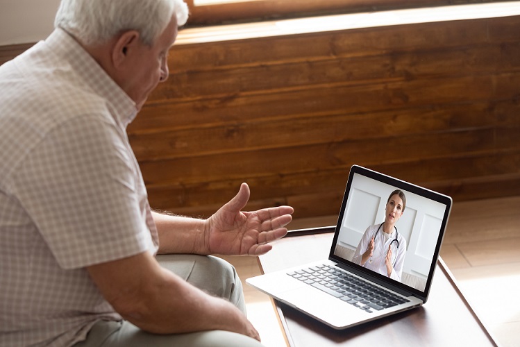 older patient with doctor on video call